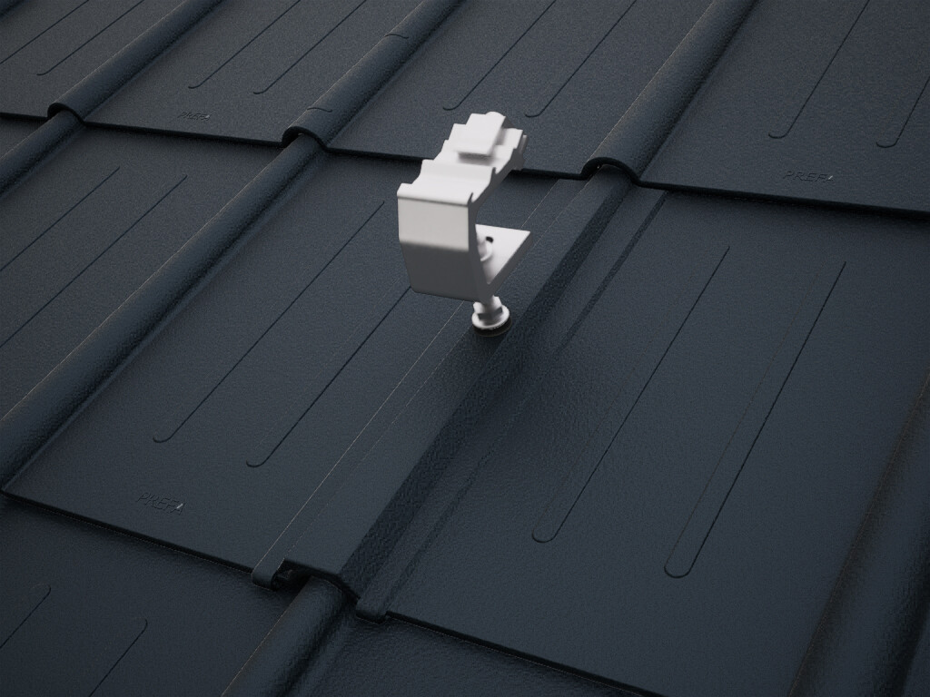 Detailed view of the PREVARIO Sunny Special solar bracket, mounted on a dark roof covered with PREFA roof tiles.